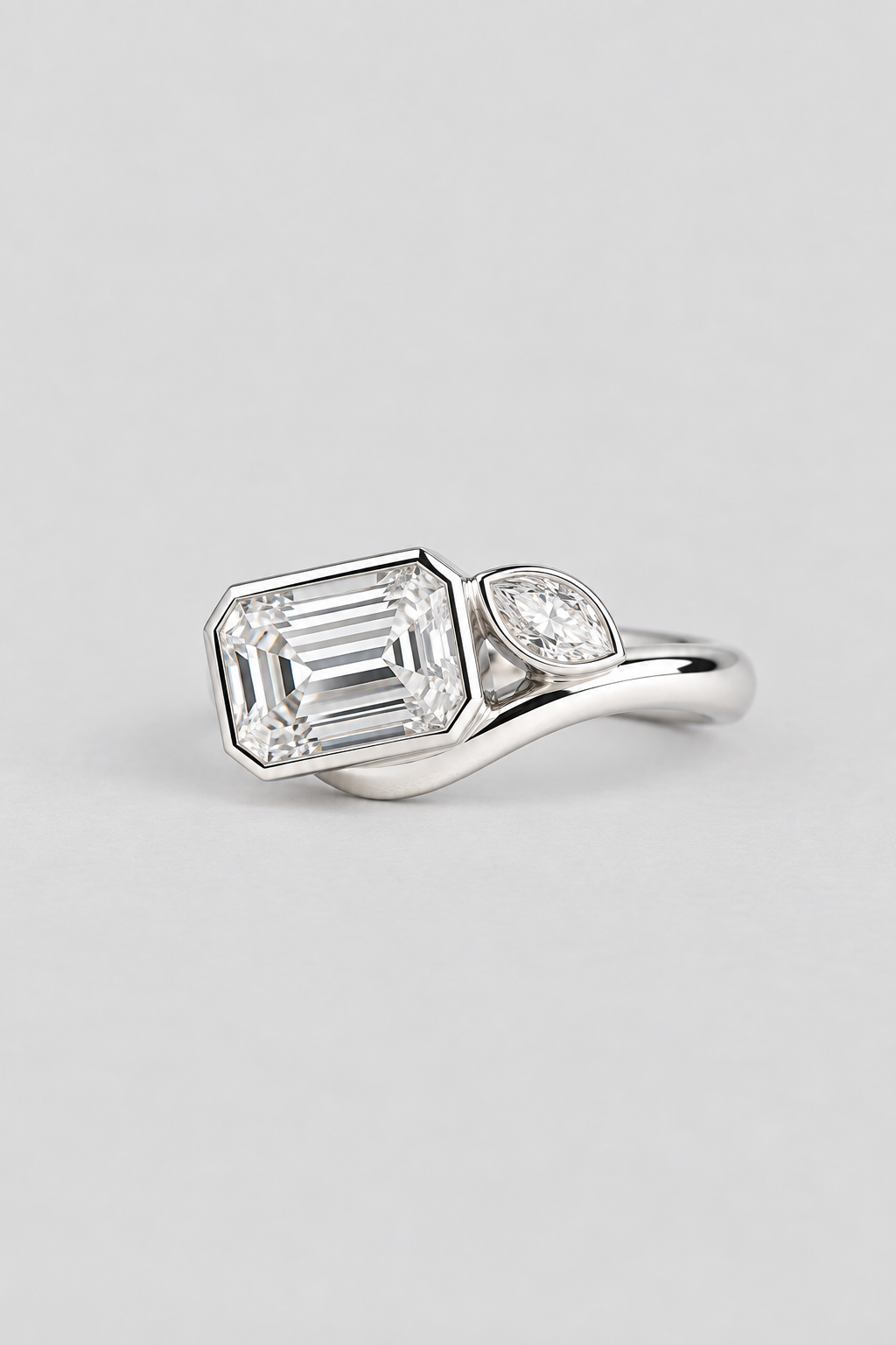 Florence Emerald cut diamond and marquise