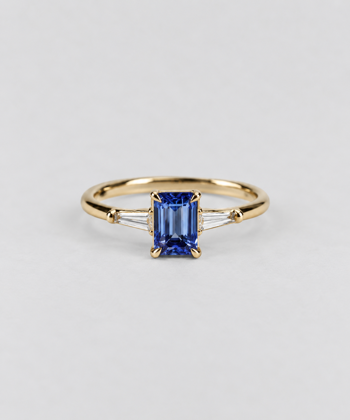 Belle - Emerald cut sapphire 18ct Yellow gold