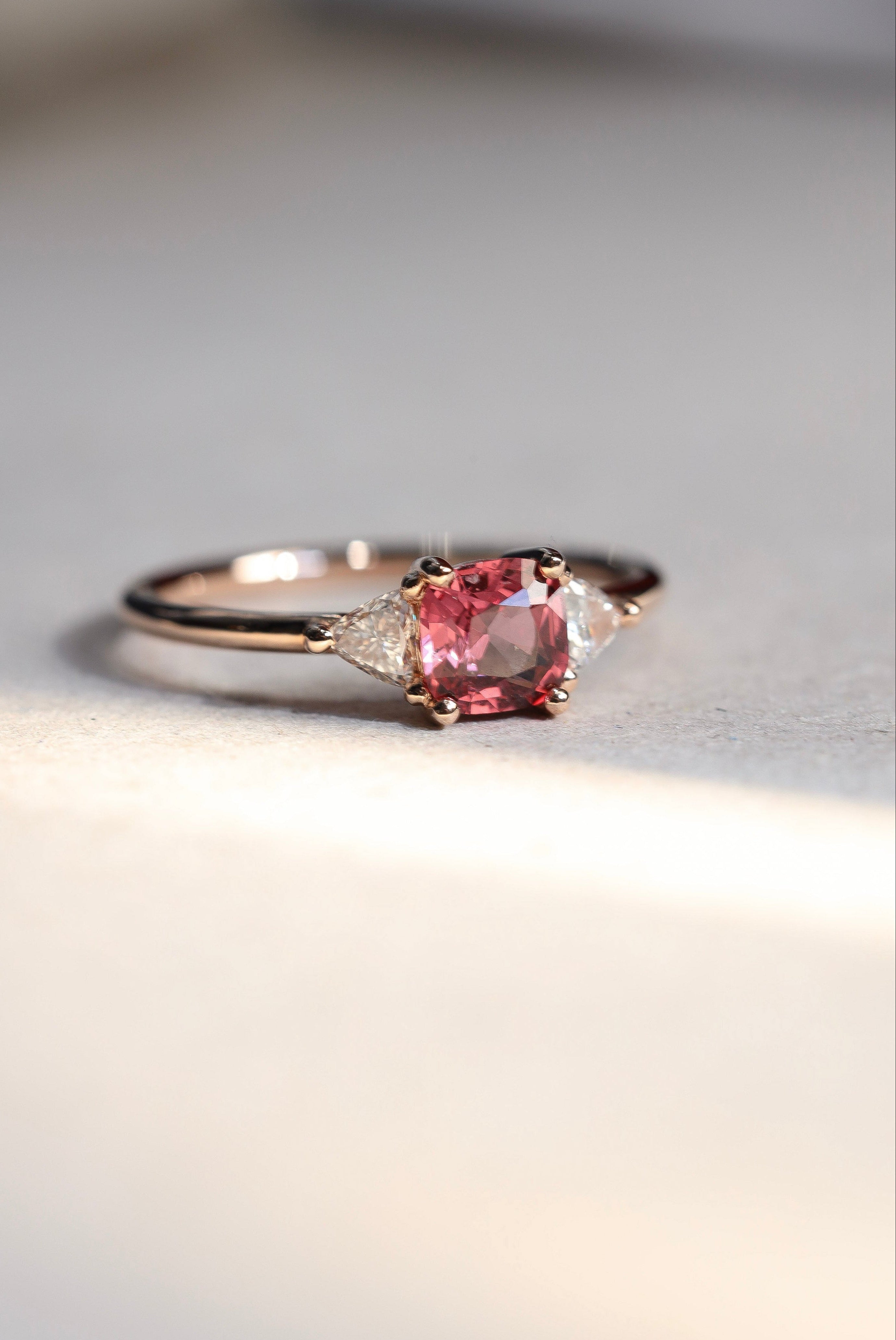 pink gemstone and diamond rose gold ring