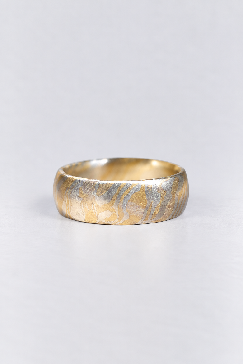 platinum and gold mokume wedding ring 7.5mm